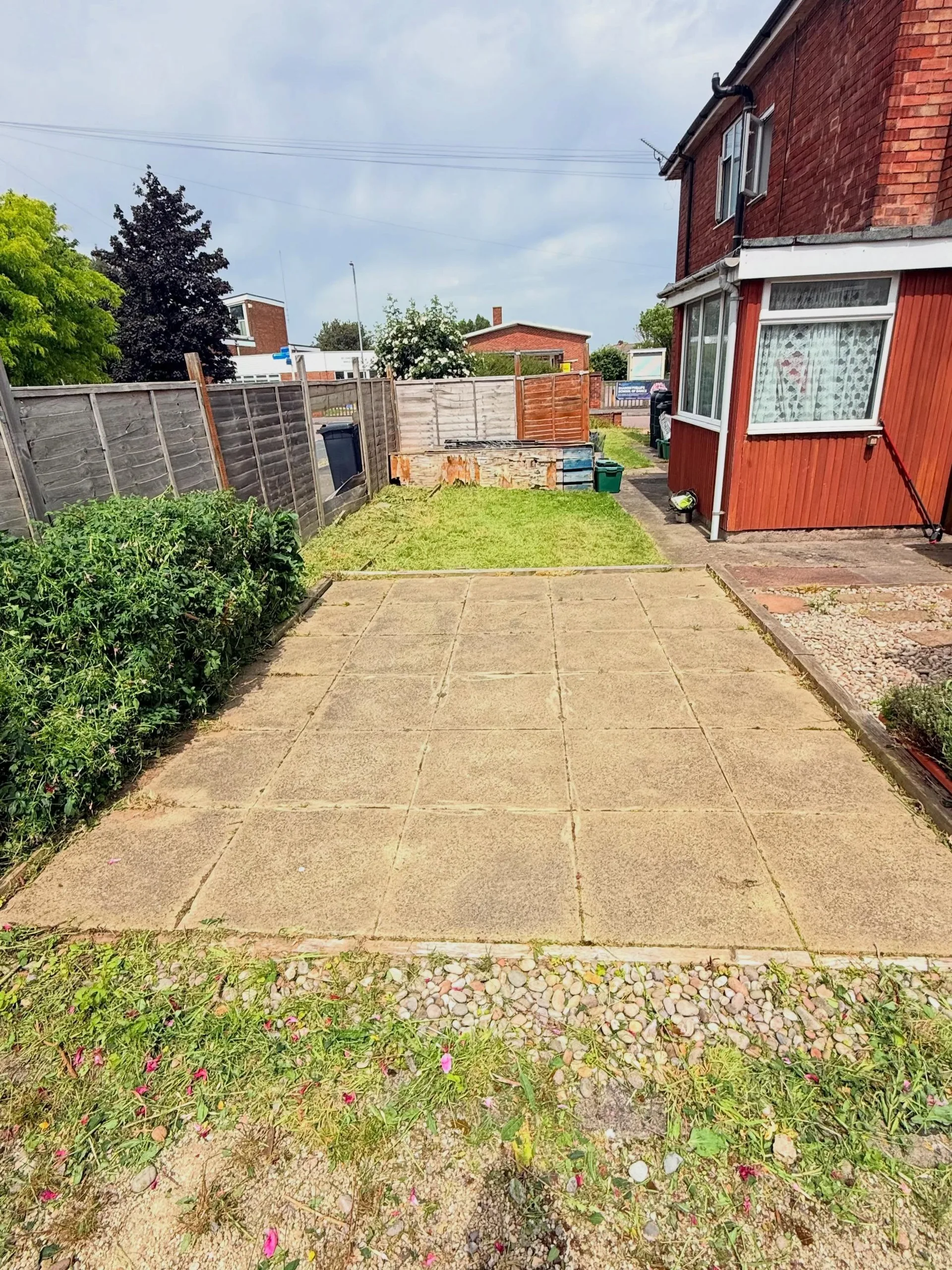 Neat gravel garden pathway with stepping stones, after tidy-up