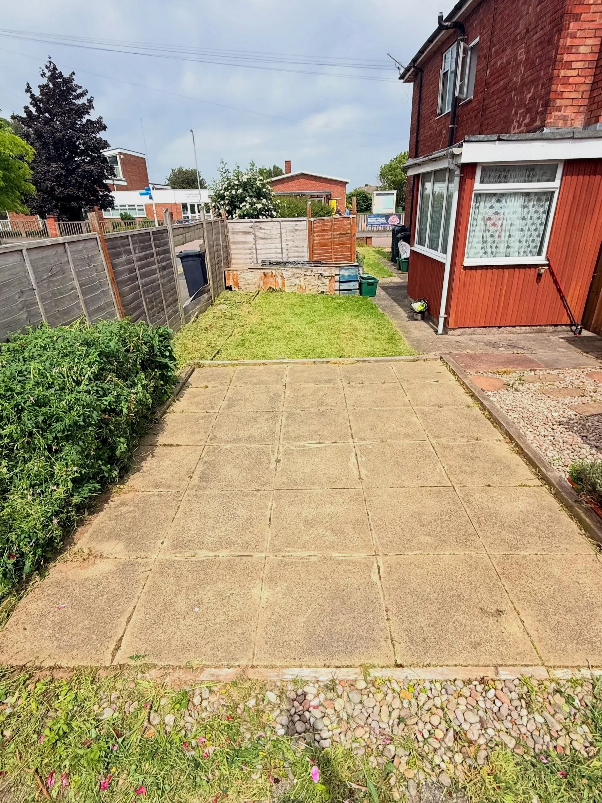 Freshly mowed side garden lawn, neat and even